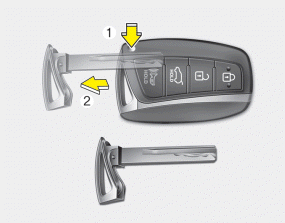 To remove the mechanical key, press and hold the release button(1) and remove